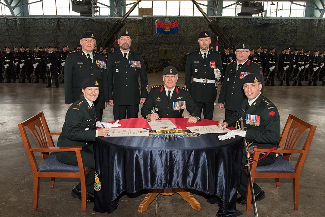 The Change of Command scrolls are signed 